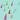 Colorful sailboats scattered on aqua greeting card